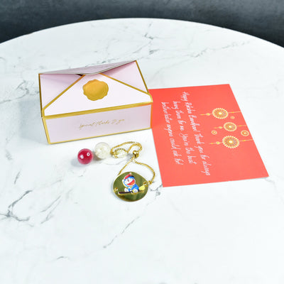 Mayii Exquisite Doraemon Rakhi Pack of 1 with Roli Chawal and Greeting card combo for Raksha Bandhan and Gifting
