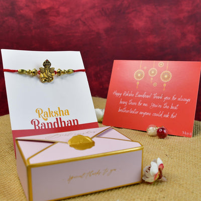 Mayii Exquisite Golden Ganesha Rakhi Pack of 1 with Roli Chawal and Greeting card combo for Raksha Bandhan and Gifting image 3