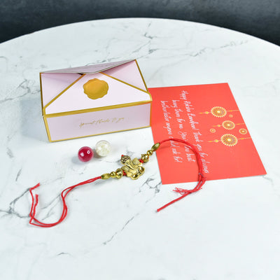 Mayii Exquisite Golden Ganesha Rakhi Pack of 1 with Roli Chawal and Greeting card combo for Raksha Bandhan and Gifting