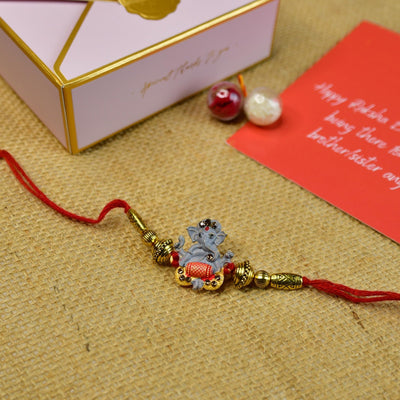 Mayii Exquisite Grey Ganesha Rakhi Pack of 1 with Roli Chawal and Greeting card combo for Raksha Bandhan and Gifting