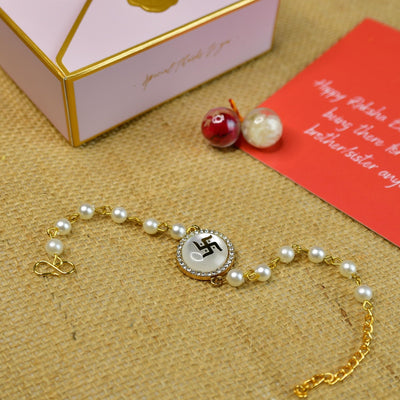 Mayii Exquisite Swastik Rakhi Pack of 1 with Roli Chawal and Greeting card combo for Raksha Bandhan and Gifting