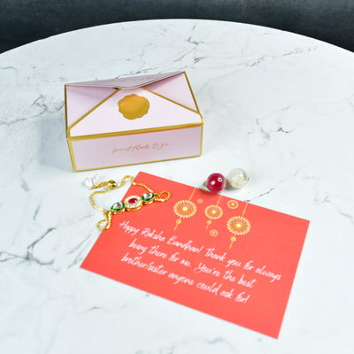 Mayii Exquisite Tri Red Green Rakhi Pack of 1 with Roli Chawal and Greeting card combo for Raksha Bandhan and Gifting