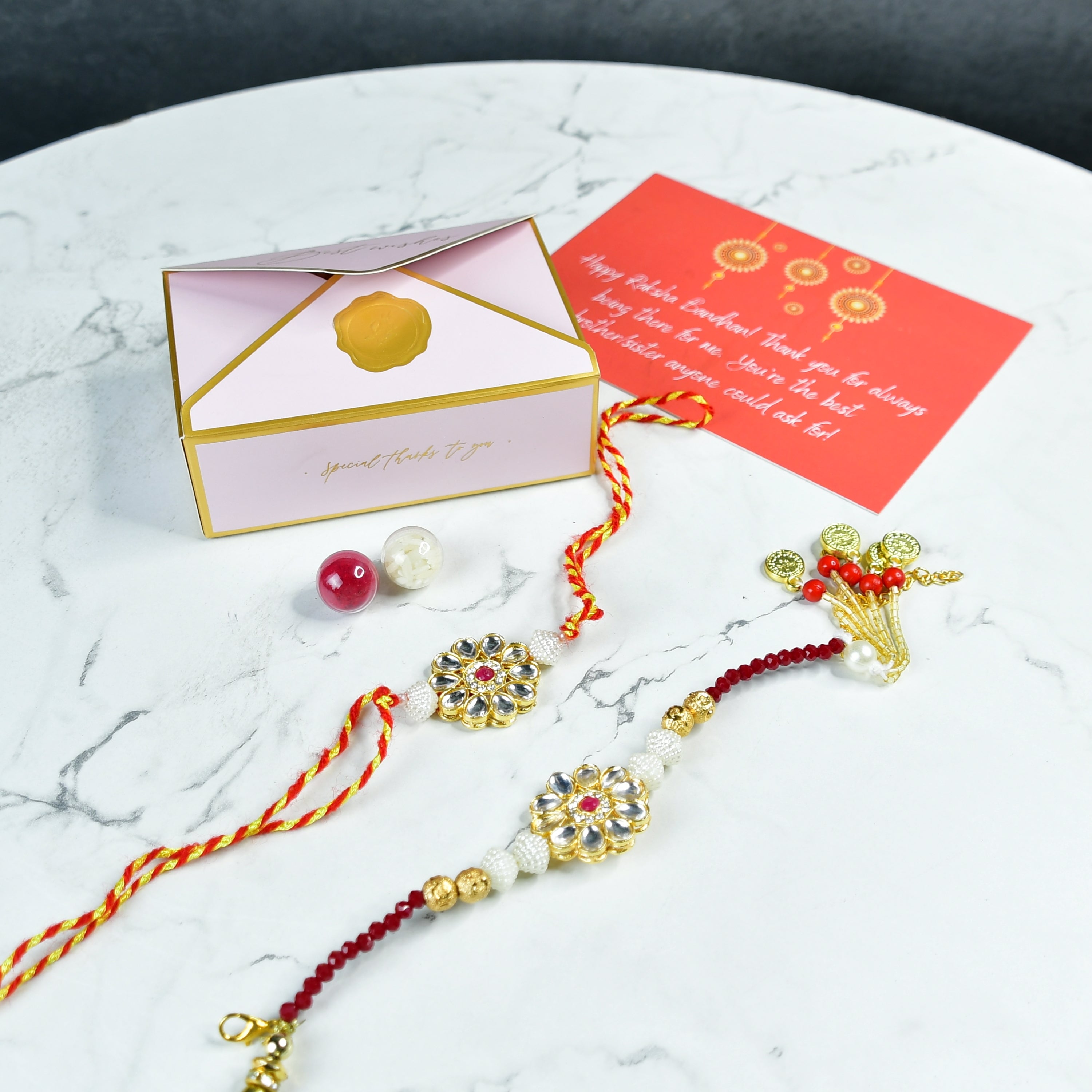 Mayii Exquisite Red Centre Flower Rakhi Pack of 2 with Roli Chawal and Greeting card combo for Raksha Bandhan and Gifting - Mayii - Mayii